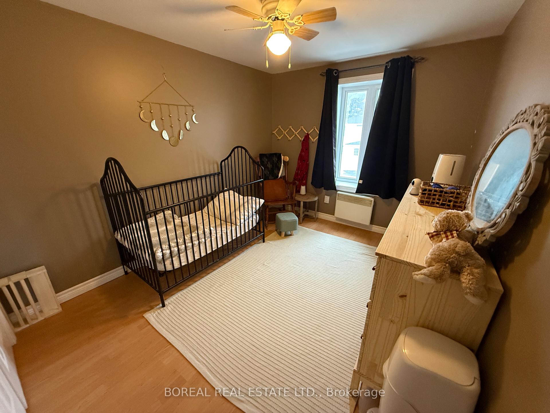 Photo 35 of 211 Second Avenue, Cochrane — HOMEH