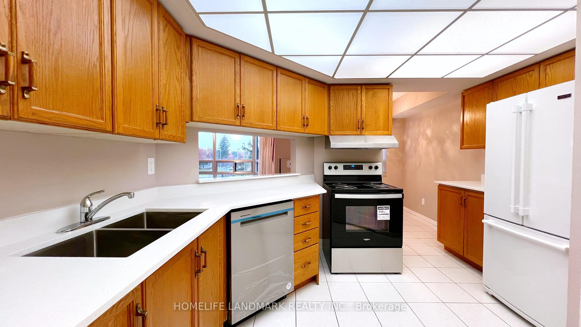 Photo 5 of Unit 209, 330 Mill Street S, Brampton, Brampton South — HOMEH