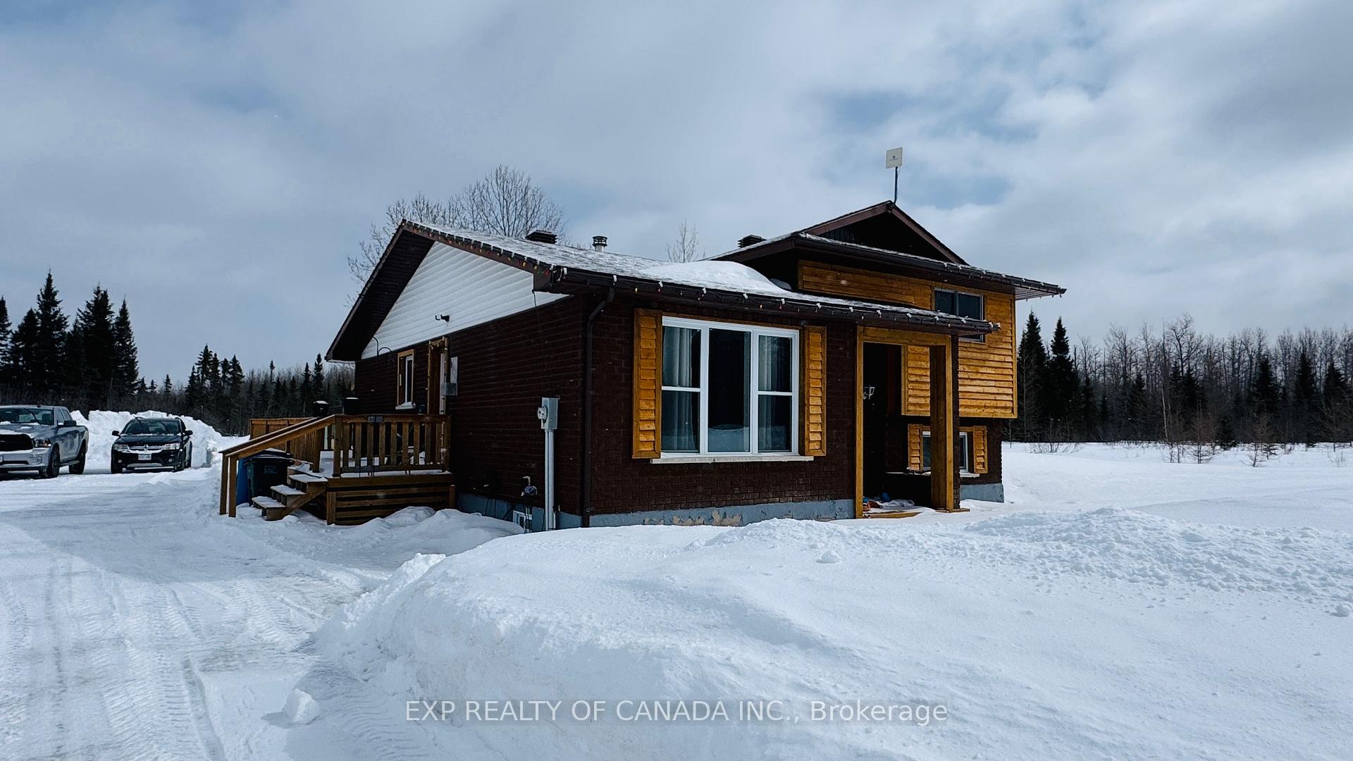 Photo 1 of 1084 Highway 11 S, Cochrane — HOMEH