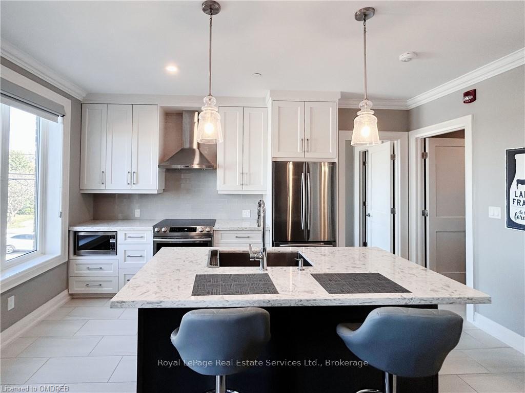 Photo 2 of Unit 210, 257 Millen Road, Hamilton, Stoney Creek — HOMEH