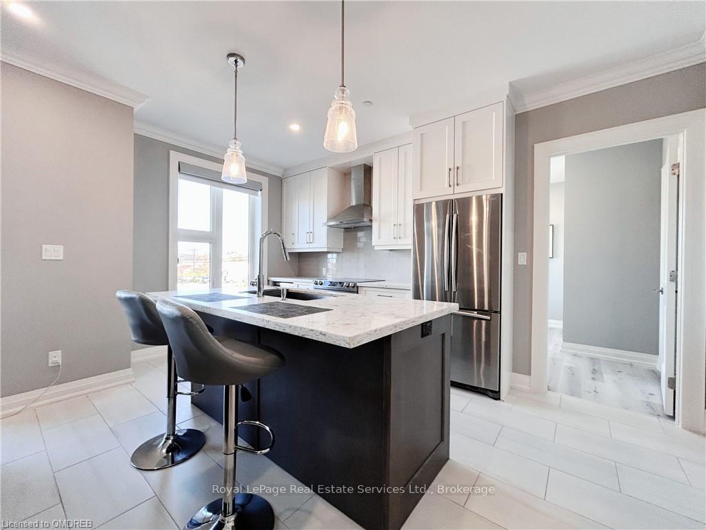 Photo 3 of Unit 210, 257 Millen Road, Hamilton, Stoney Creek — HOMEH