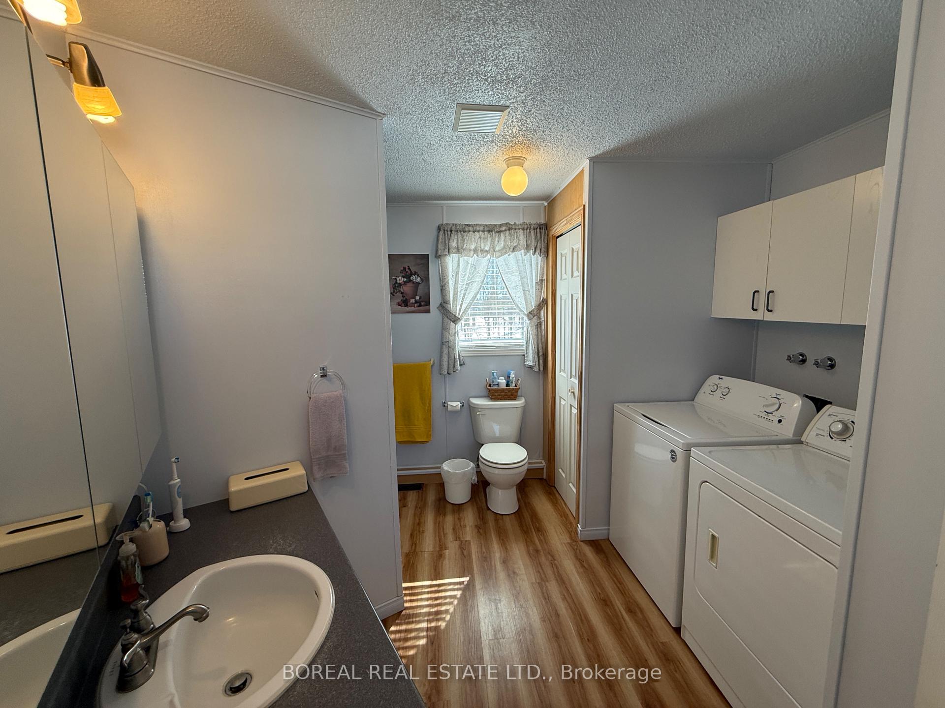 Photo 18 of 110 Parkwood Avenue, Cochrane — HOMEH