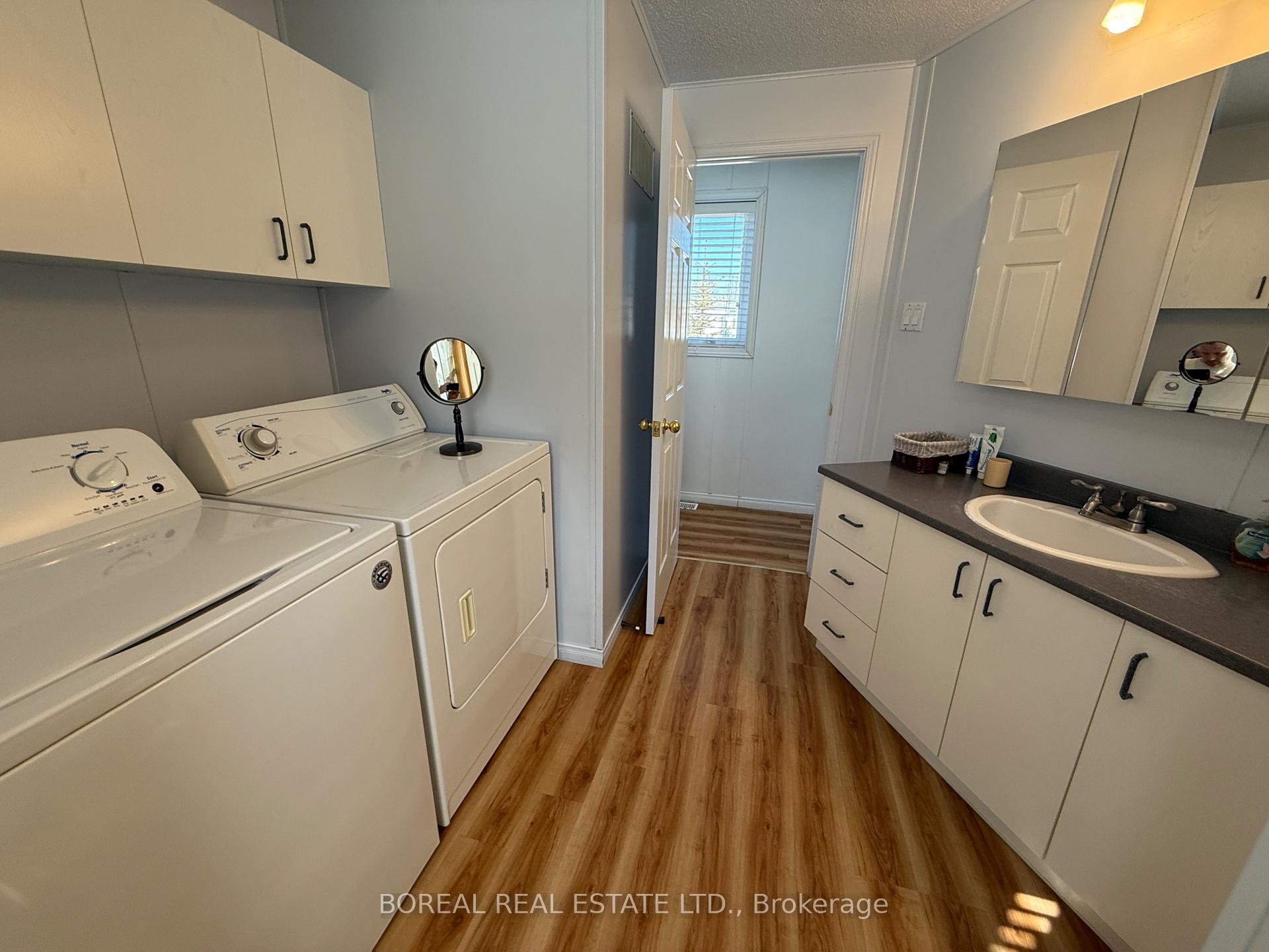Photo 19 of 110 Parkwood Avenue, Cochrane — HOMEH