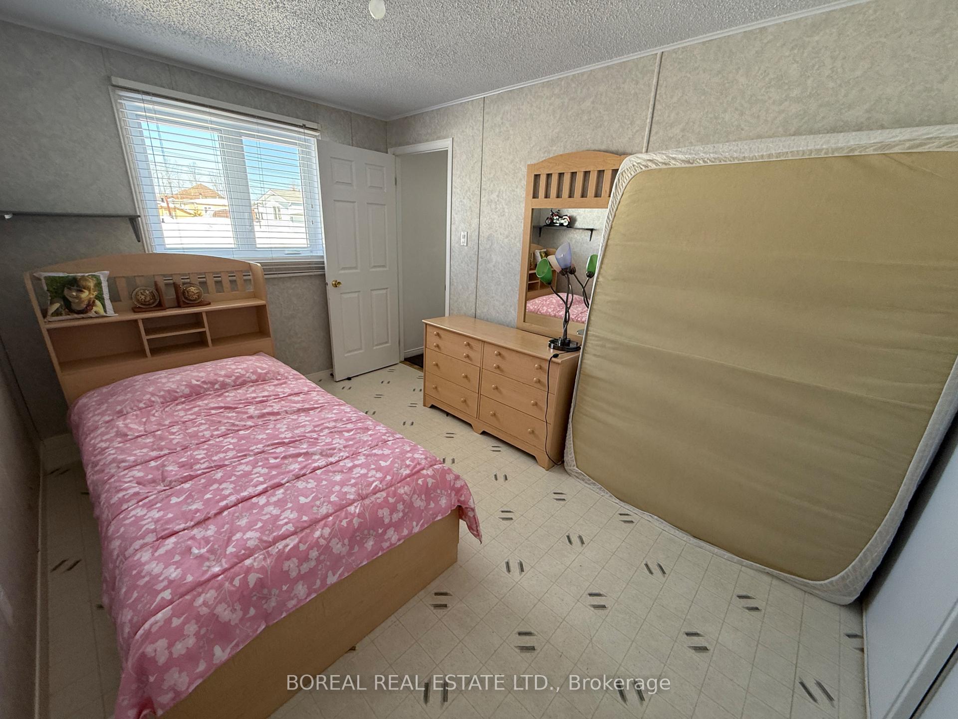 Photo 24 of 110 Parkwood Avenue, Cochrane — HOMEH