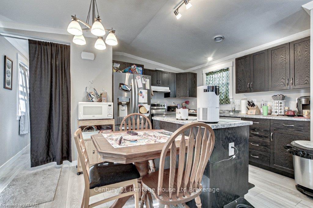 Photo 11 of Unit 21 Belsize Dr, 99 Fourth Concession Road, Brant, Brantford Twp — HOMEH