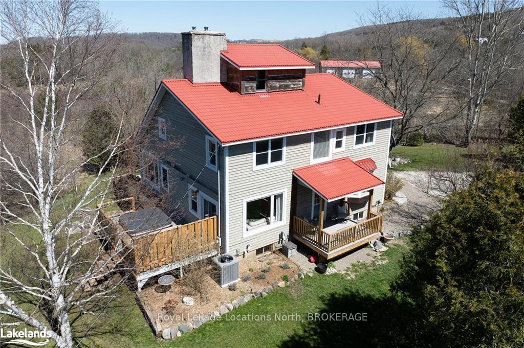 Front of 635017 Pretty River Road