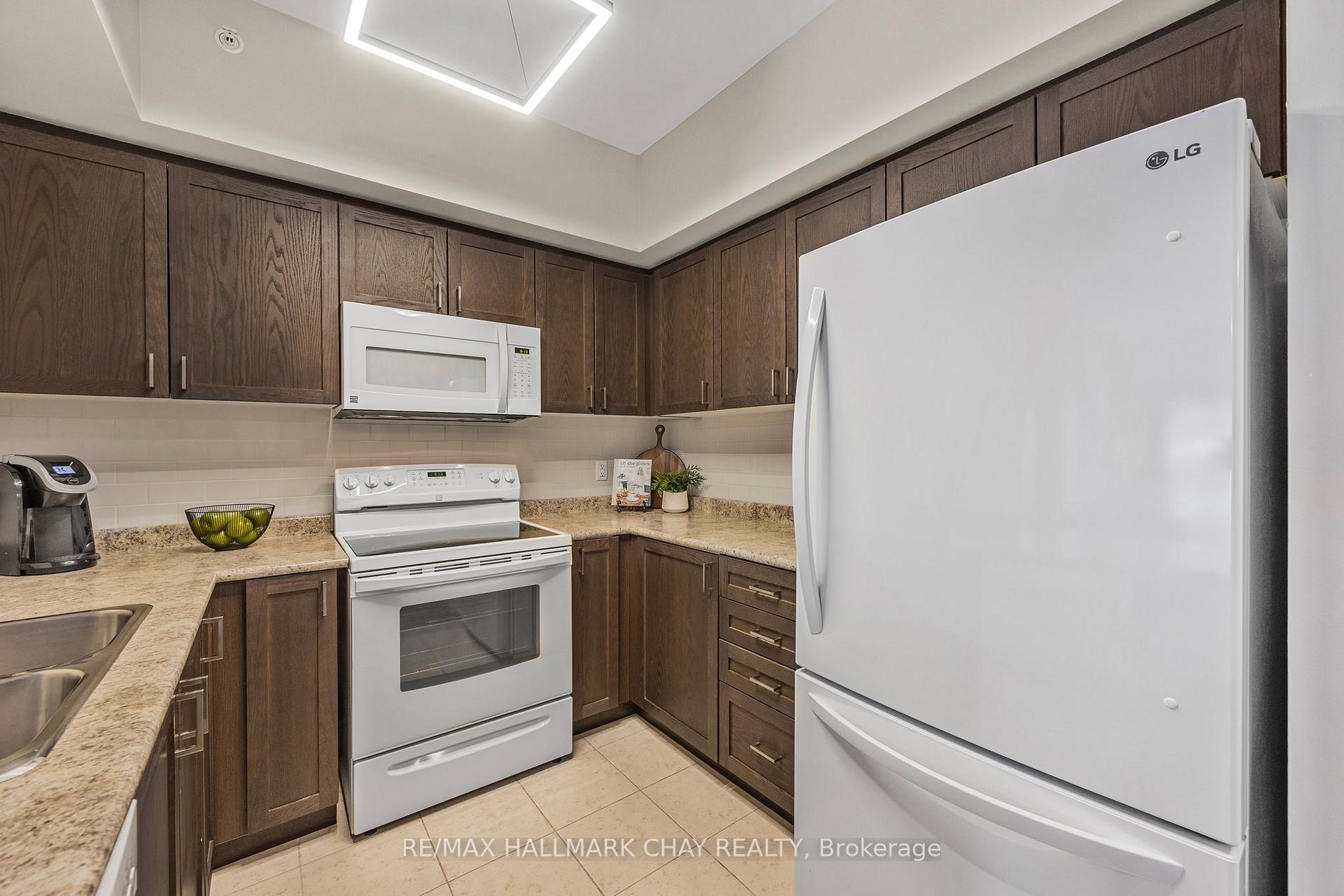 Photo 7 of Unit 107, 100 Dean Avenue, Barrie, Painswick South — HOMEH