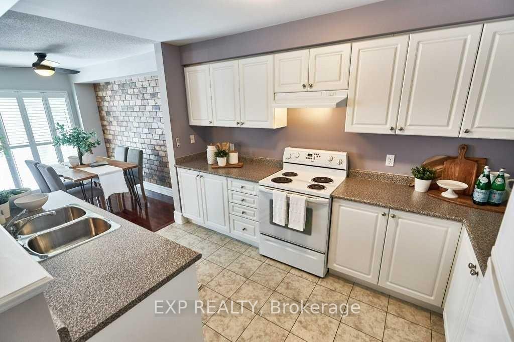 Photo 9 of Unit Unit #8, 460 Woodmount Drive, Oshawa, Samac — HOMEH