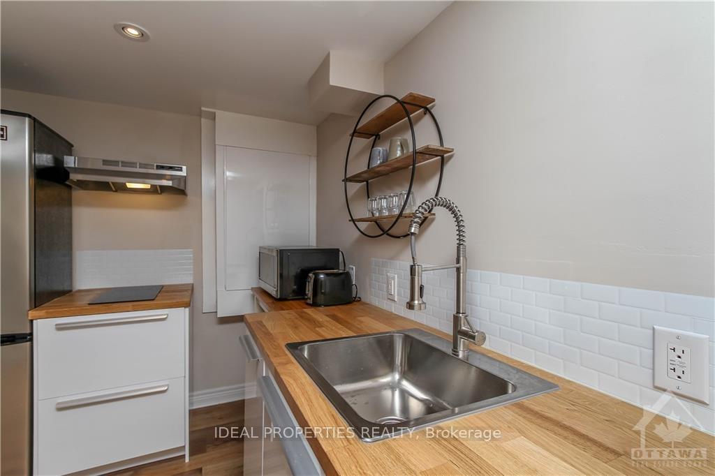 Photo 5 of 1952 Olympia Crescent, Ottawa, Elmvale Acres/Urbandale — HOMEH
