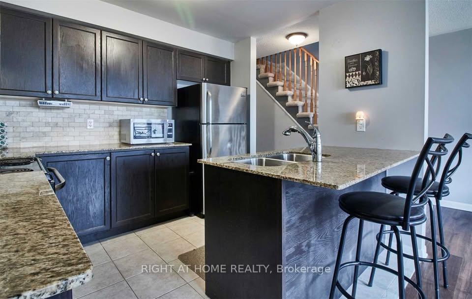 Photo 5 of 23 Farmstead Drive, Clarington, Bowmanville — HOMEH