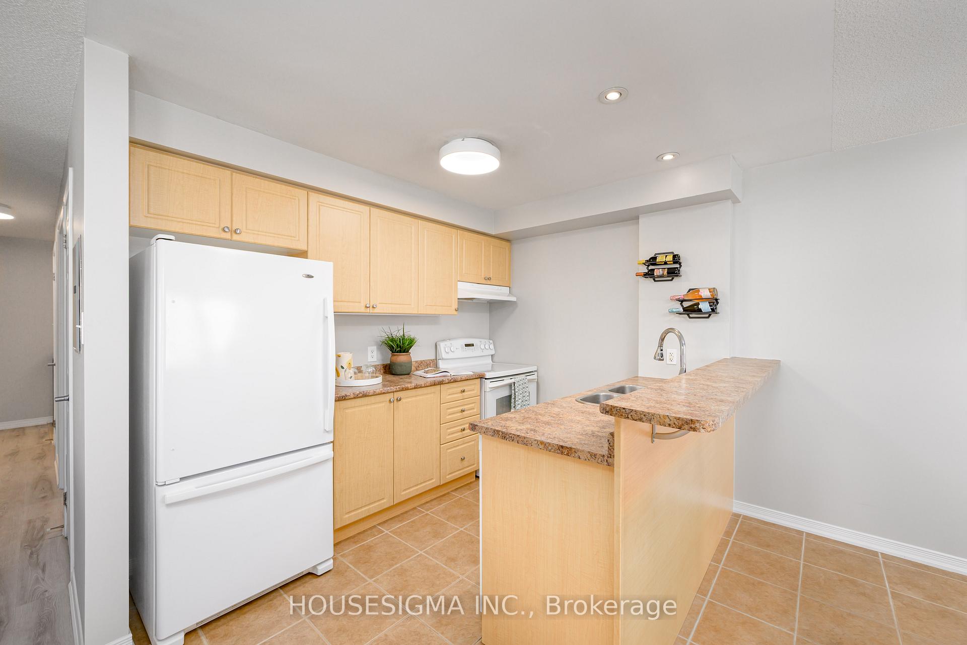 Photo 5 of Unit 206, 136 Aspen Springs Drive, Clarington, Bowmanville — HOMEH