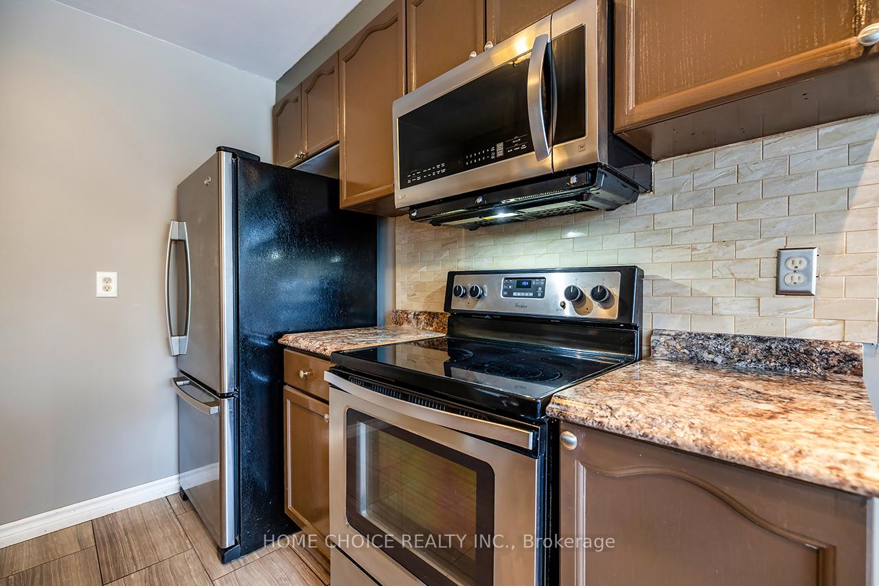 Photo 9 of 51 Park Lane Circle E, Clarington, Bowmanville — HOMEH