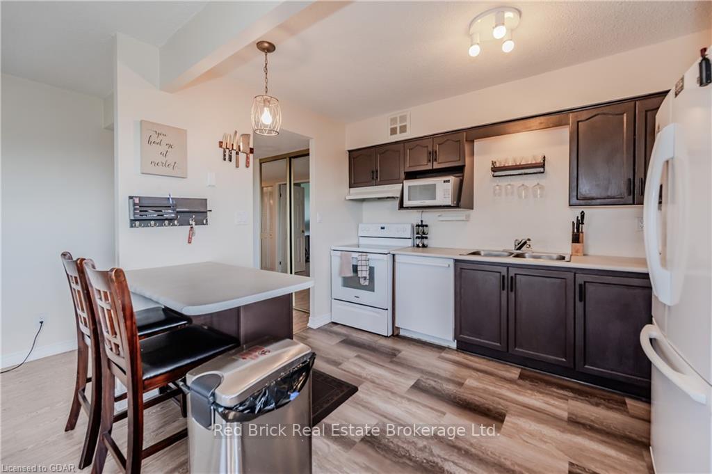 Photo 6 of Unit 706, 260 Sheldon Avenue N, Kitchener — HOMEH