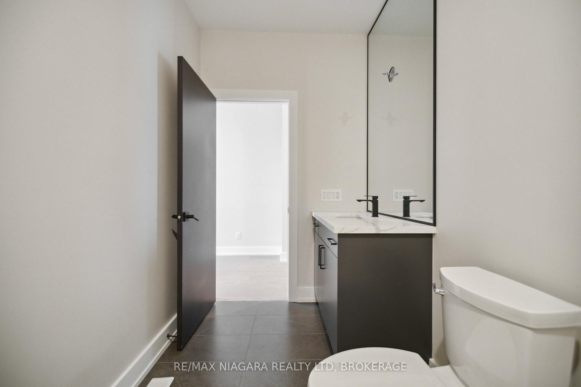 Photo 11 of Unit 2, 300 Richmond Street, Thorold, Confederation Heights — HOMEH