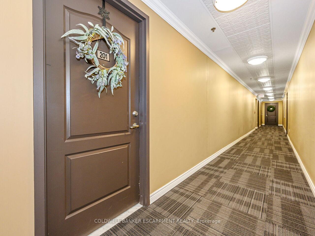 Front of Unit 201, 1419 Costigan Road N