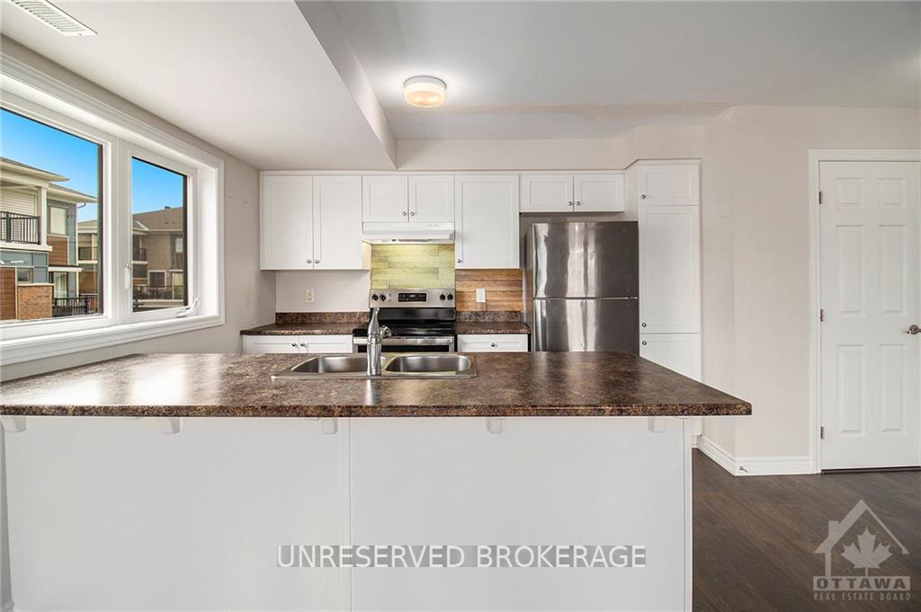 Photo 6 of 311 Aphelion Crescent, Ottawa, Barrhaven - Half Moon Bay — HOMEH