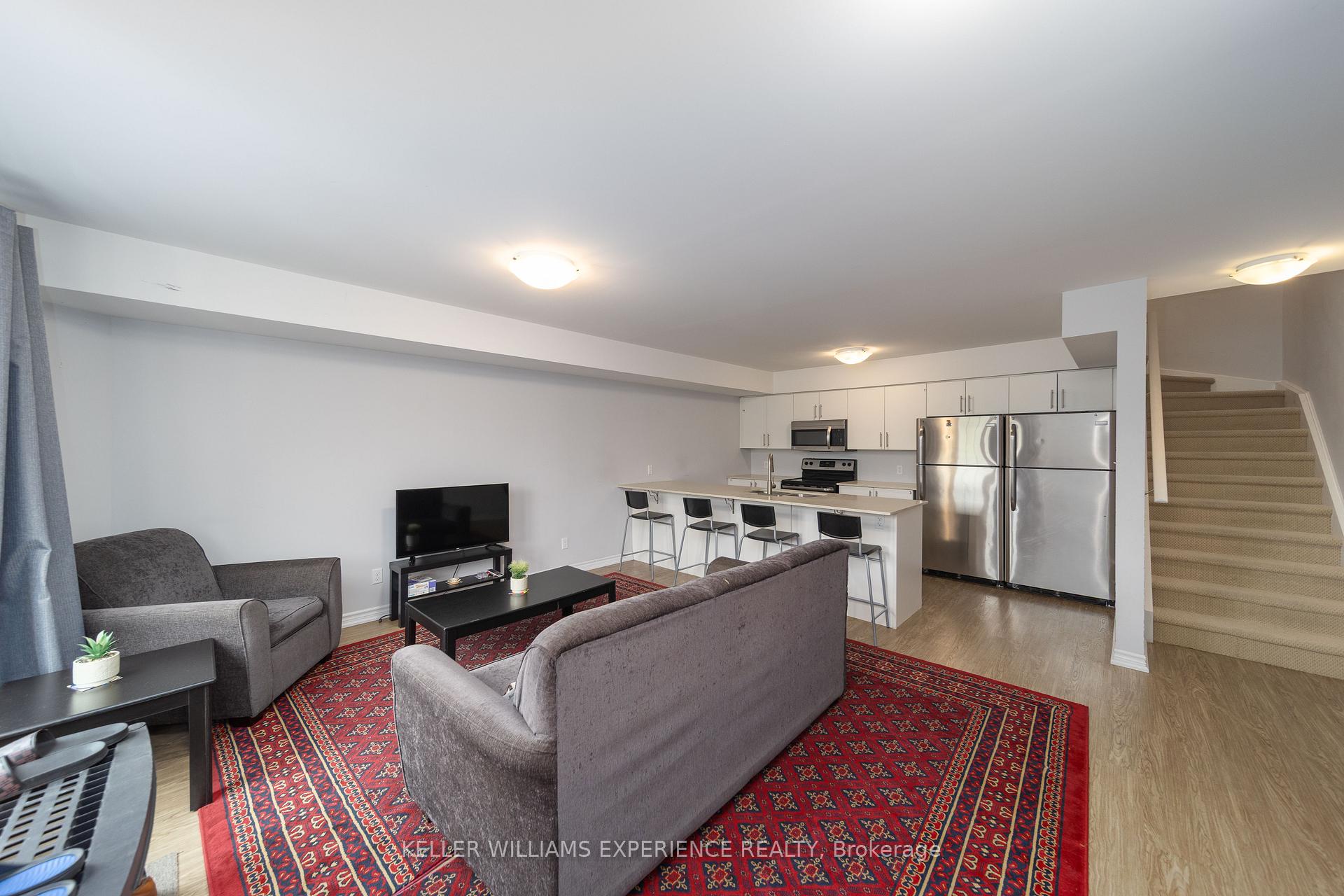 Photo 3 of Unit 2, 242 Penetanguishene Road, Barrie, Grove East — HOMEH