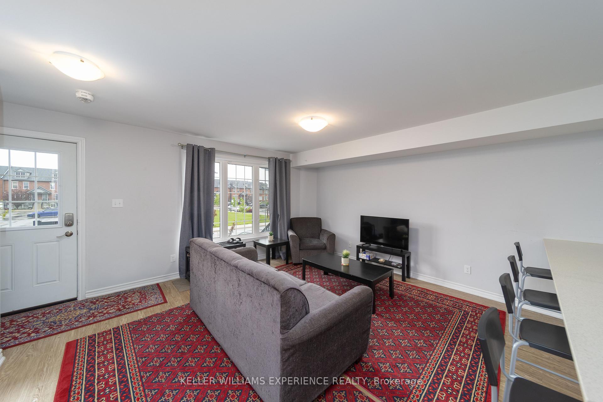 Photo 5 of Unit 2, 242 Penetanguishene Road, Barrie, Grove East — HOMEH