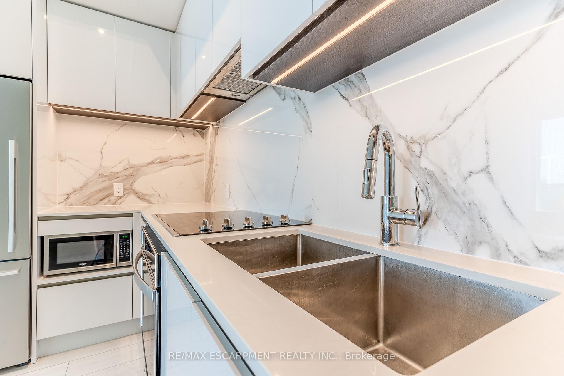 Photo 7 of Unit TH23, 7 Buttermill Avenue, Vaughan, Vaughan Corporate Centre — HOMEH