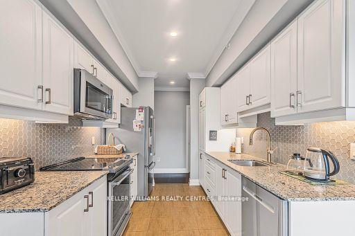 Photo 11 of Unit 401, 306 Essa Road, Barrie, Holly — HOMEH