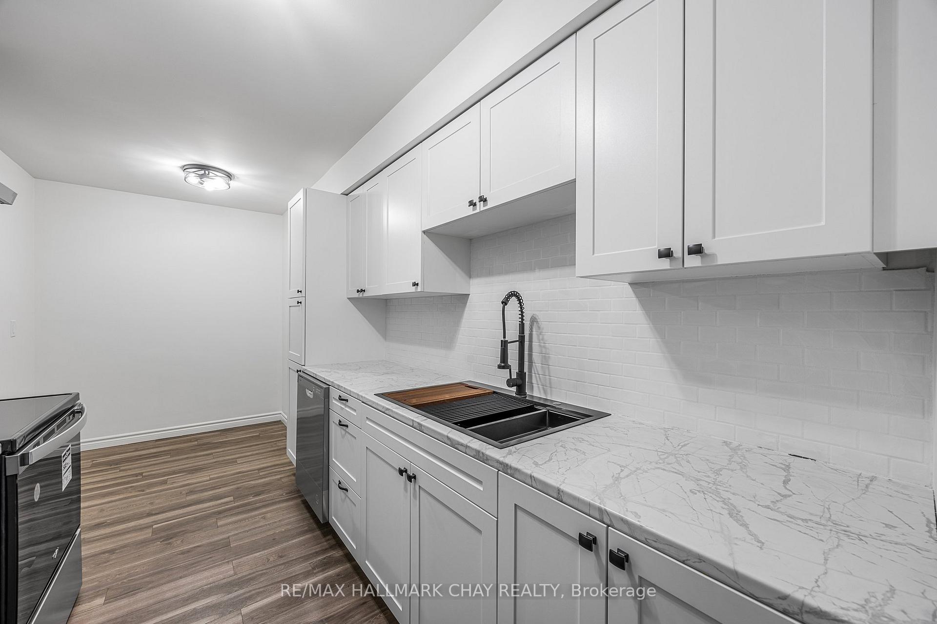 Photo 11 of Unit 6, 2 Bernick Drive, Barrie, Grove East — HOMEH