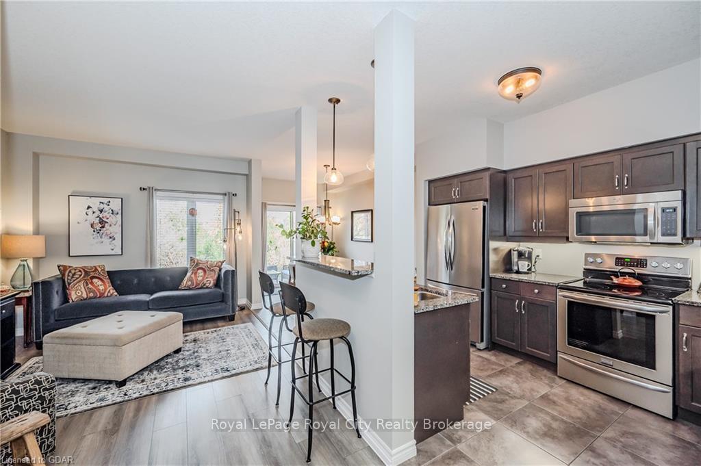 Photo 11 of Unit 13, 146 Downey Road, Guelph, Kortright Hills — HOMEH
