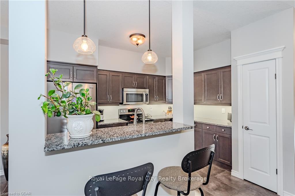 Photo 17 of Unit 13, 146 Downey Road, Guelph, Kortright Hills — HOMEH