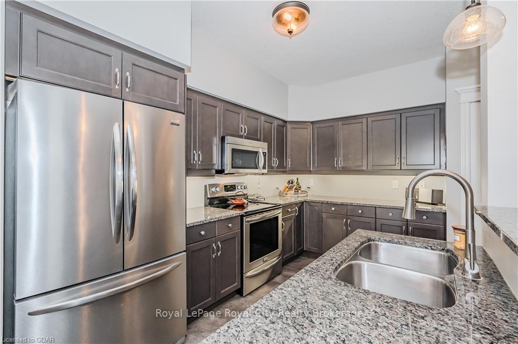 Photo 20 of Unit 13, 146 Downey Road, Guelph, Kortright Hills — HOMEH