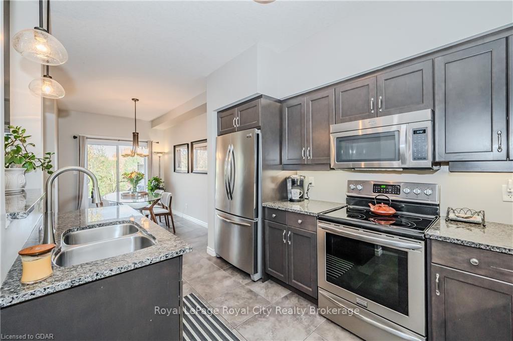 Photo 23 of Unit 13, 146 Downey Road, Guelph, Kortright Hills — HOMEH