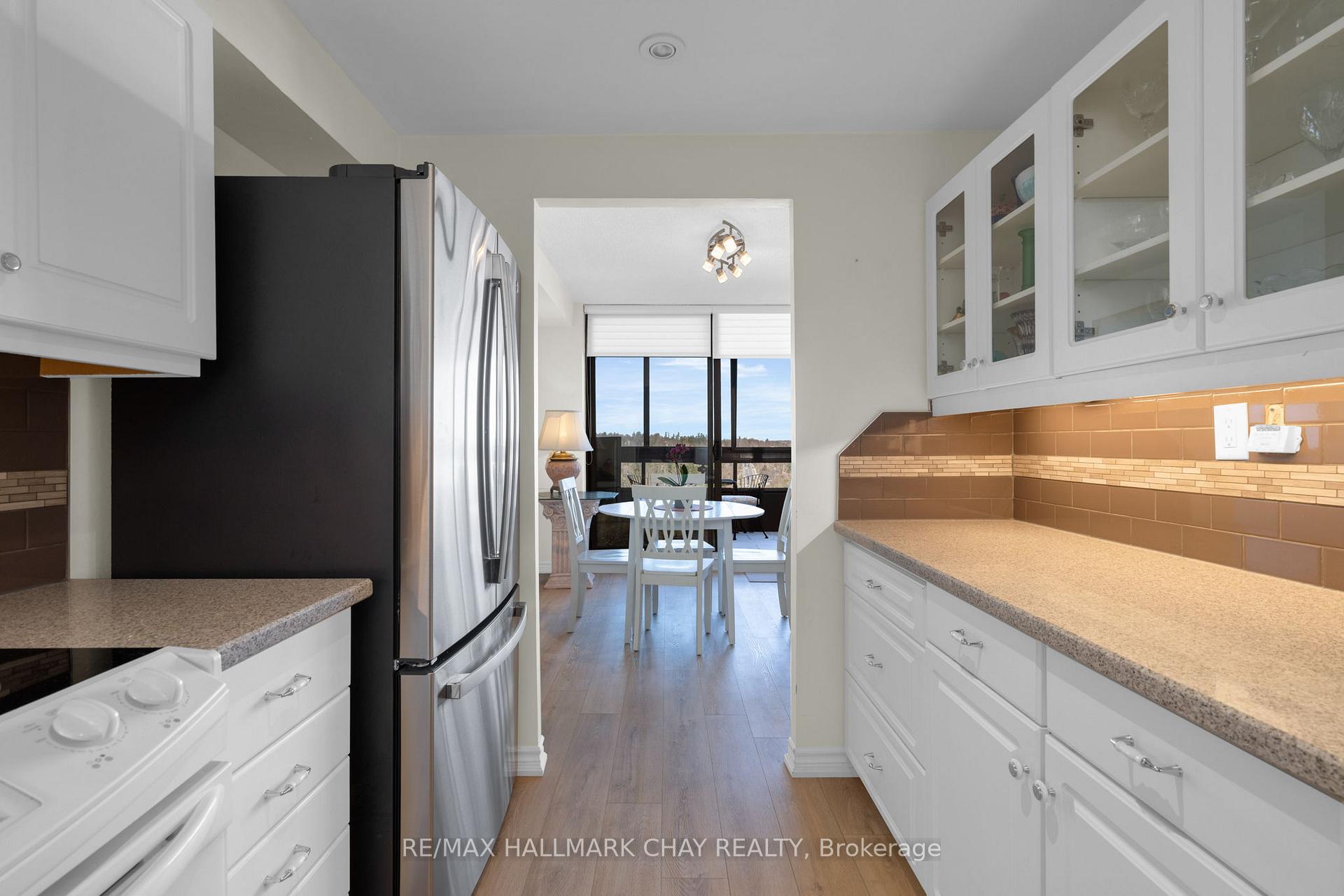 Photo 11 of Unit 1403, 181 Collier Street, Barrie, North Shore — HOMEH