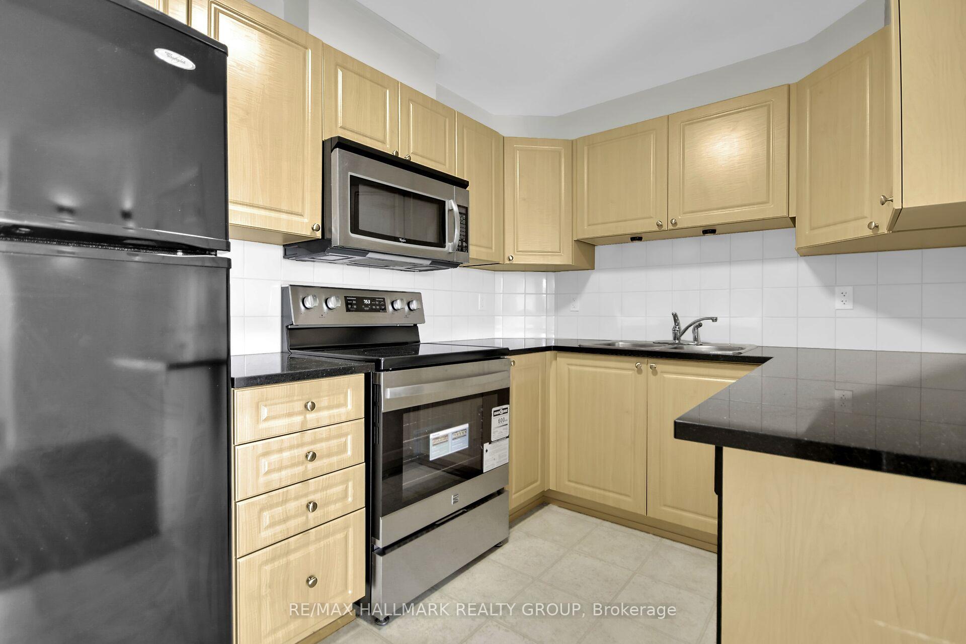 Photo 10 of Unit I, 135 Harthill Way, Ottawa, Barrhaven - Heritage Park — HOMEH