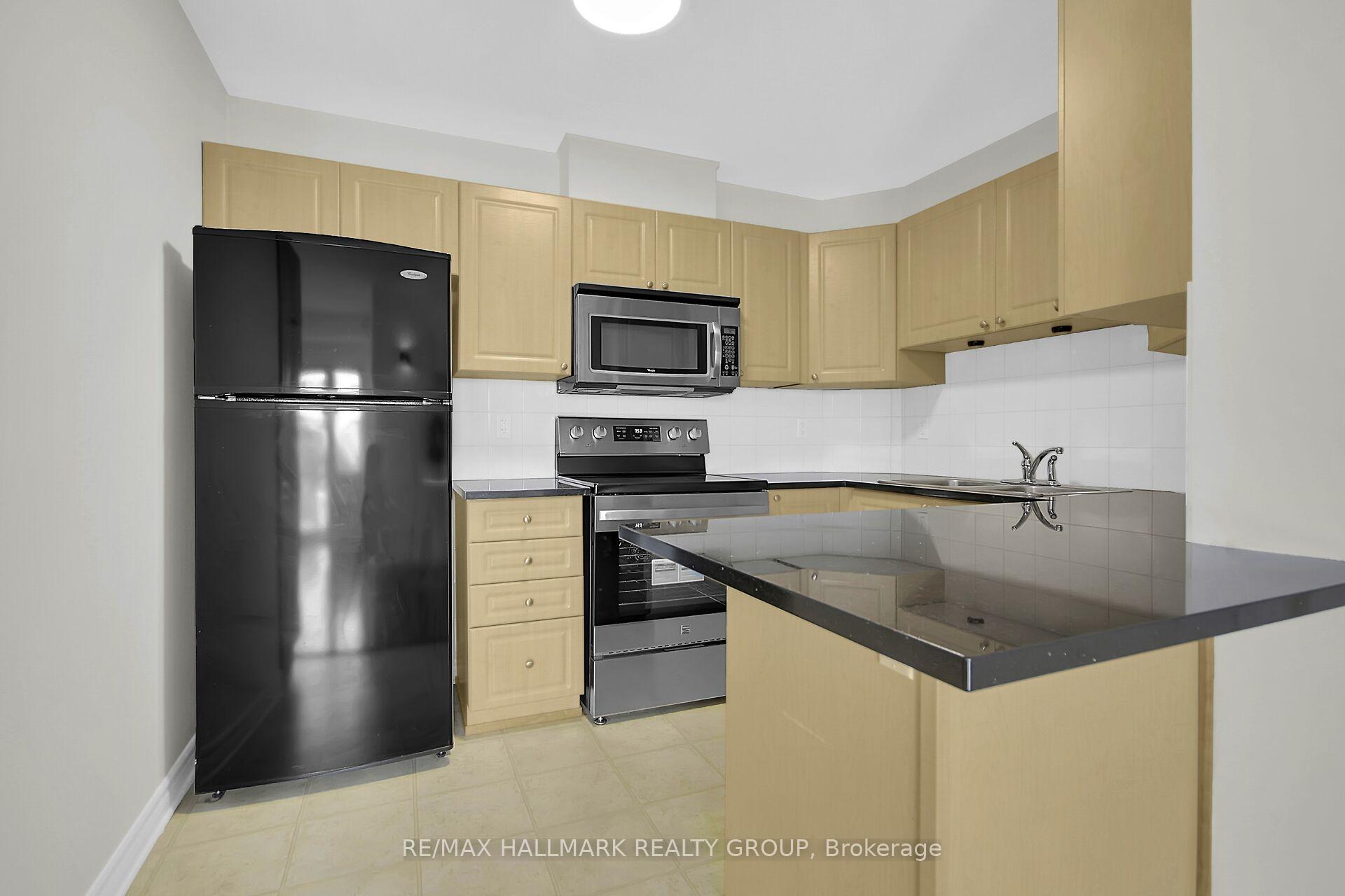 Photo 11 of Unit I, 135 Harthill Way, Ottawa, Barrhaven - Heritage Park — HOMEH