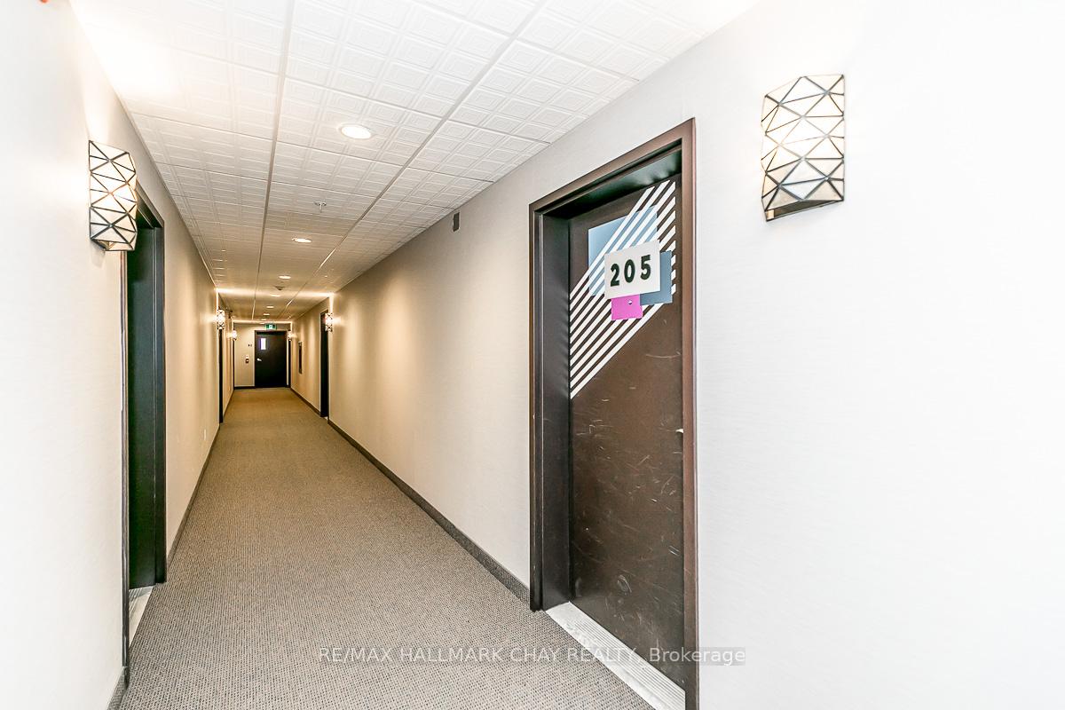 Photo 5 of Unit 205, 299 Cundles Road E, Barrie, 400 North — HOMEH