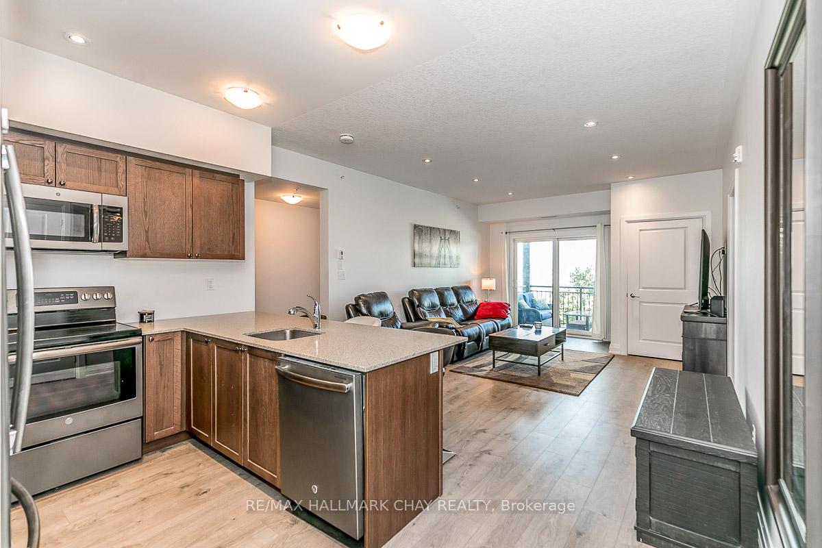Photo 6 of Unit 205, 299 Cundles Road E, Barrie, 400 North — HOMEH