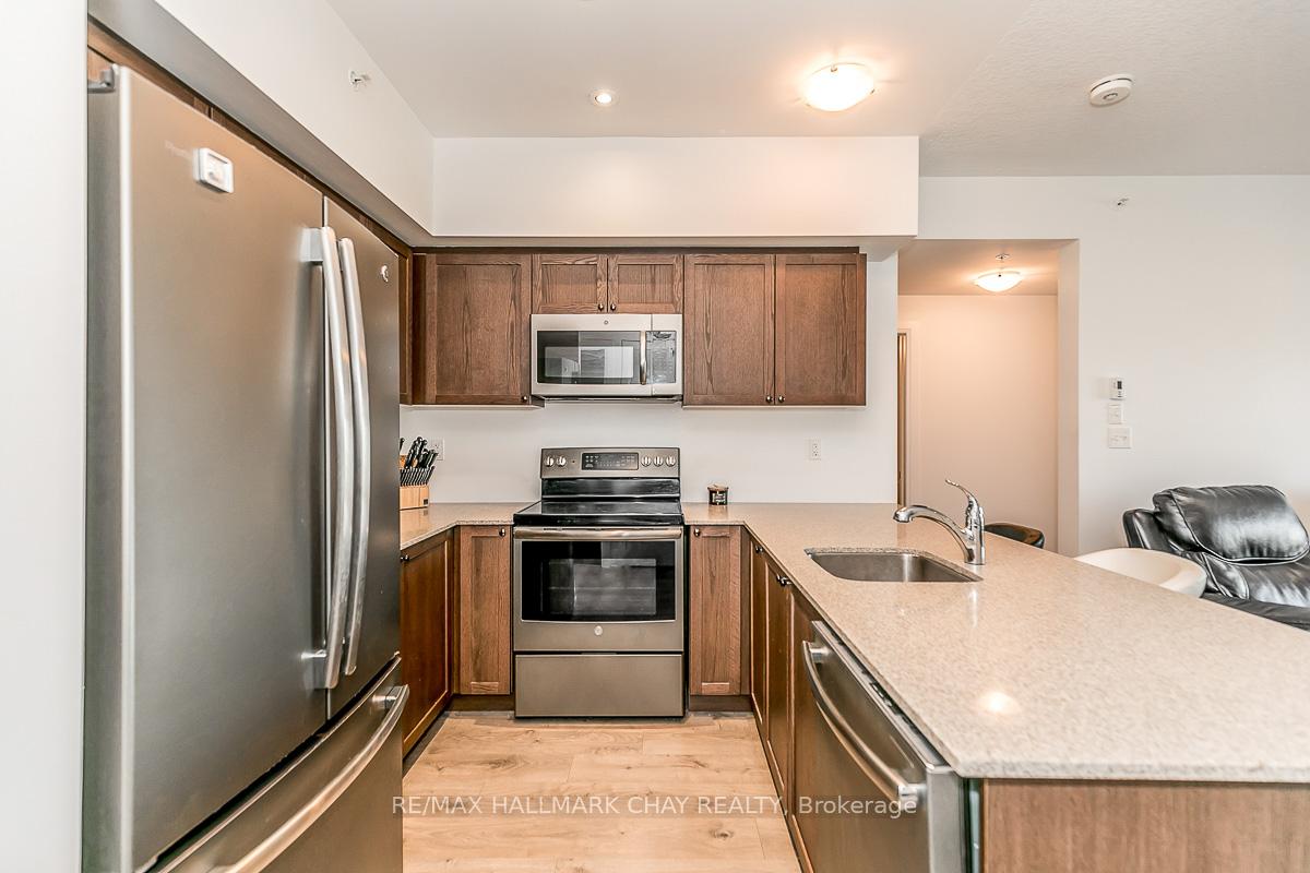 Photo 7 of Unit 205, 299 Cundles Road E, Barrie, 400 North — HOMEH