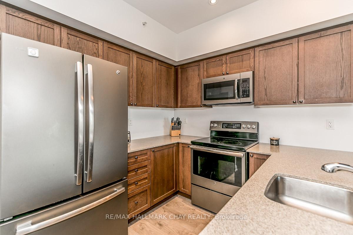 Photo 8 of Unit 205, 299 Cundles Road E, Barrie, 400 North — HOMEH