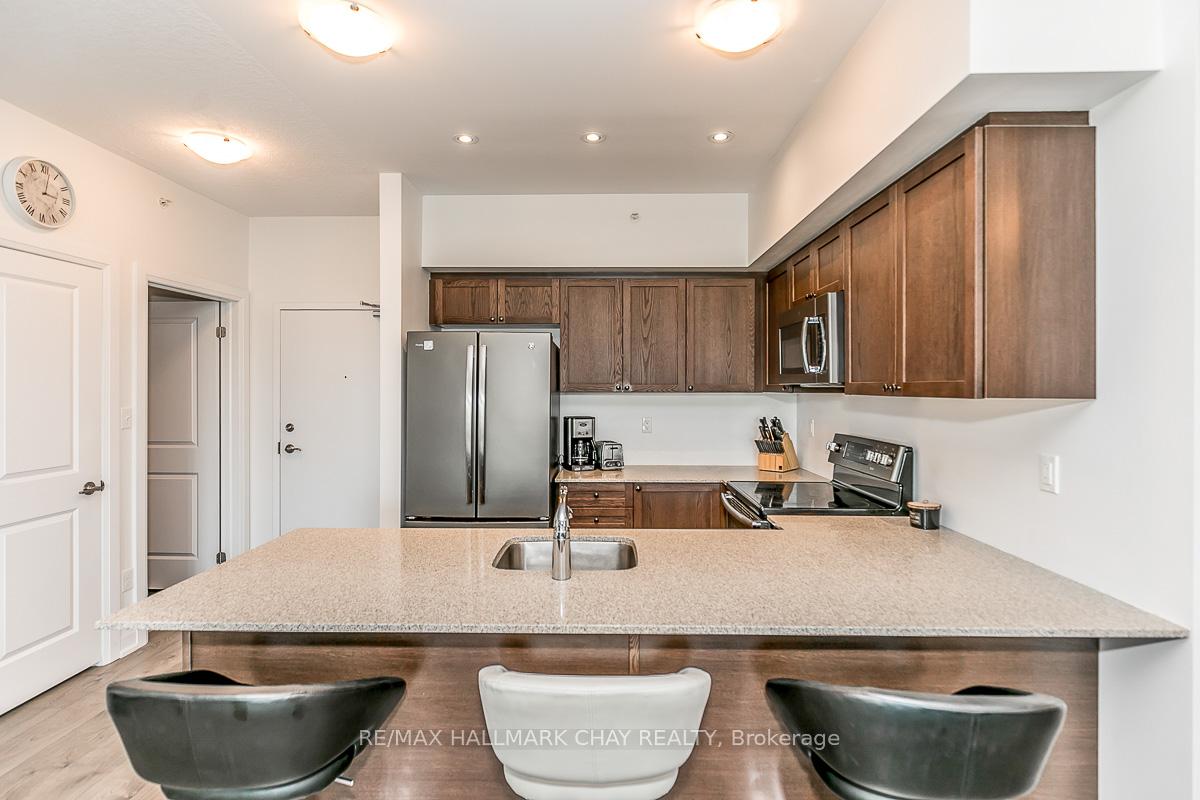 Photo 9 of Unit 205, 299 Cundles Road E, Barrie, 400 North — HOMEH