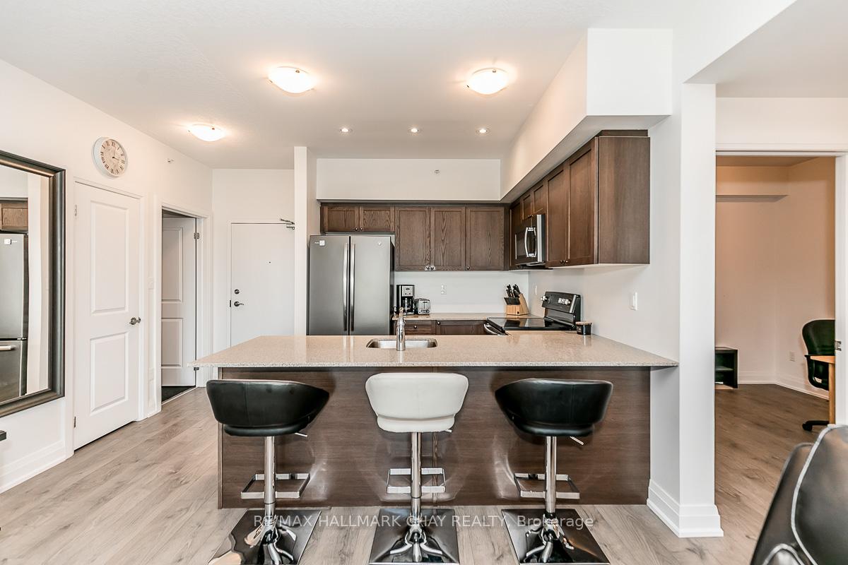 Photo 10 of Unit 205, 299 Cundles Road E, Barrie, 400 North — HOMEH