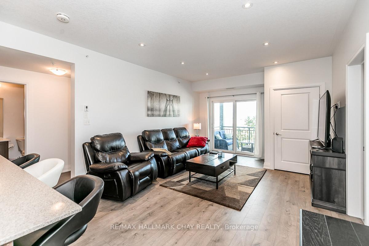 Photo 11 of Unit 205, 299 Cundles Road E, Barrie, 400 North — HOMEH