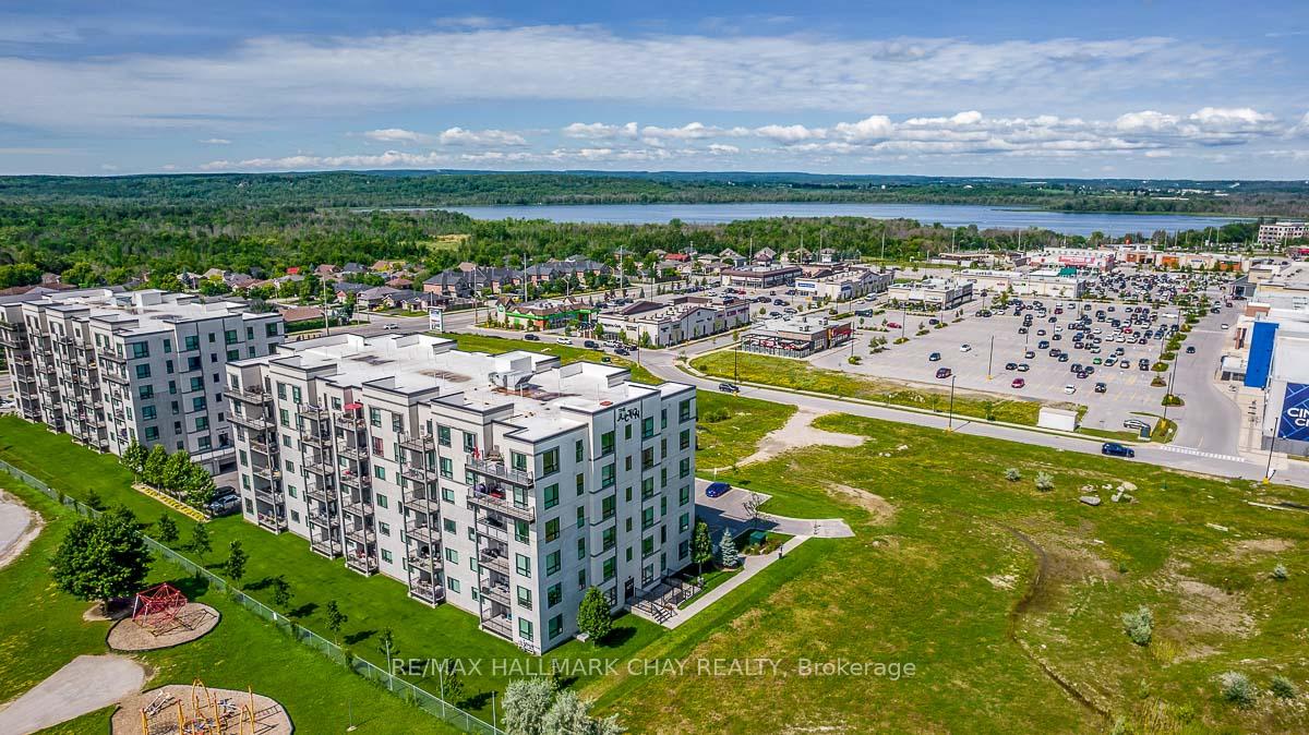 Photo 32 of Unit 205, 299 Cundles Road E, Barrie, 400 North — HOMEH