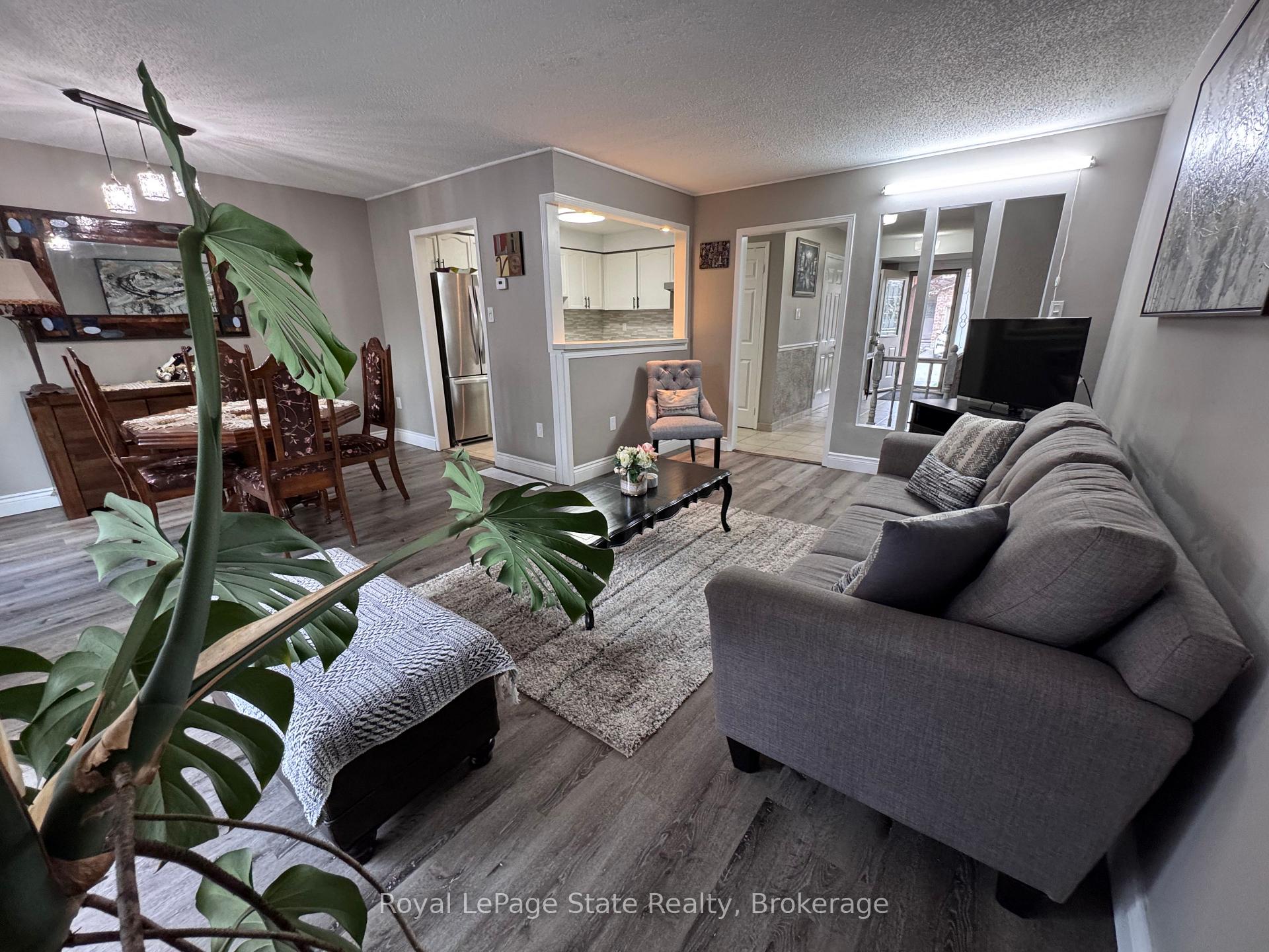 Photo 3 of Unit 1, 391 Stone Church Road E, Hamilton, Crerar — HOMEH