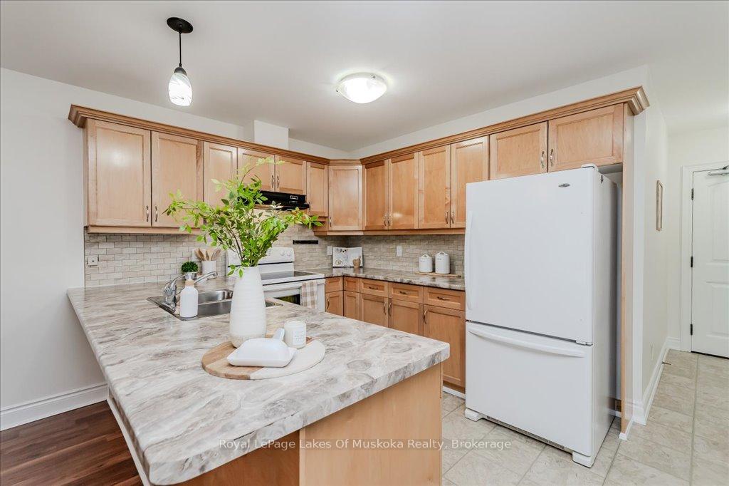 Photo 40 of Unit GL2, 10A Kimberley Avenue, Bracebridge, Macaulay — HOMEH