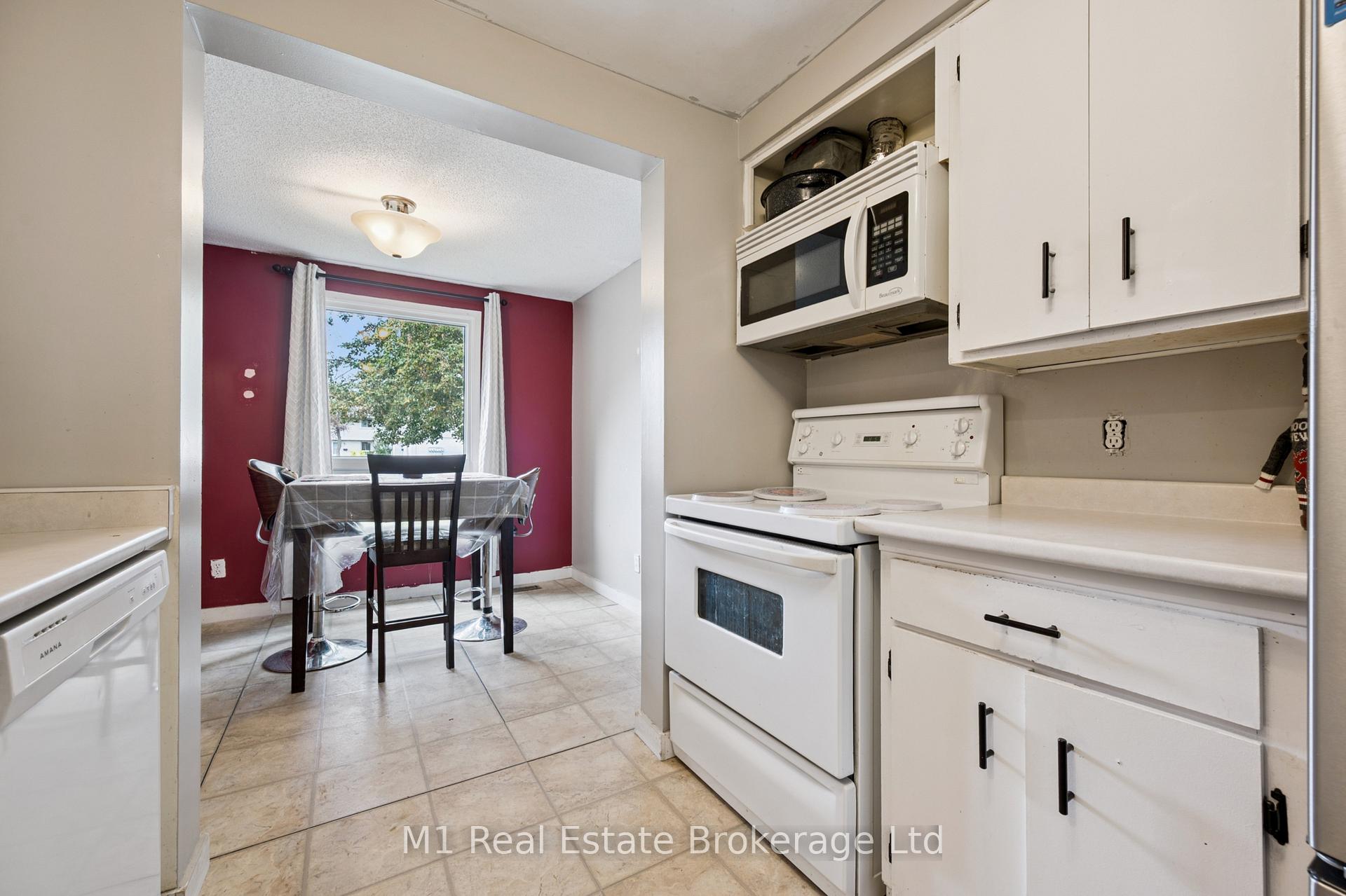 Photo 17 of Unit 13, 700 Paisley Road, Guelph, Willow West/Sugarbush/West Acres — HOMEH