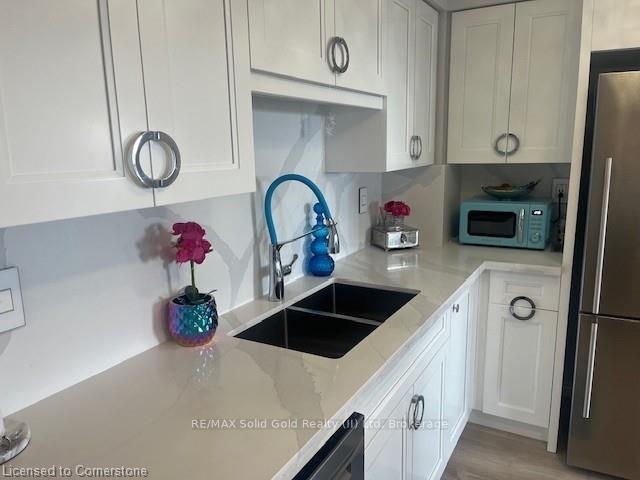 Photo 11 of Unit 606, 260 Sheldon Avenue N, Kitchener — HOMEH