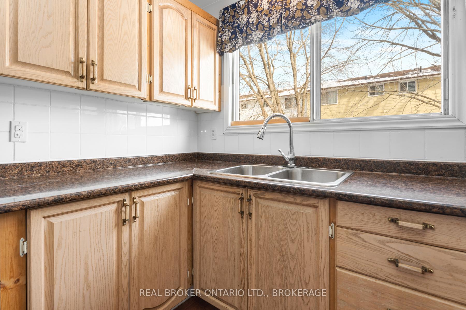 Photo 11 of Unit 6, 23 Addington Street, Loyalist, Amherstview — HOMEH