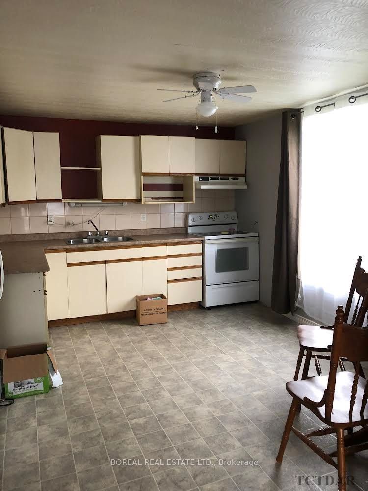 Photo 74 of 287 Tenth Avenue, Cochrane — HOMEH