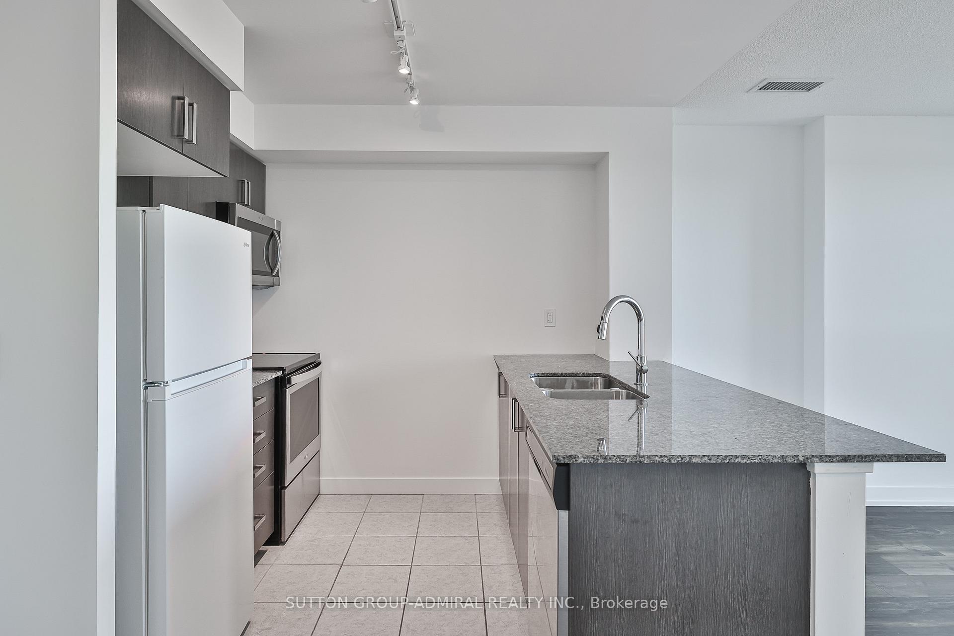 Photo 13 of Unit 809, 8 Trent Avenue, Toronto, East End-Danforth — HOMEH