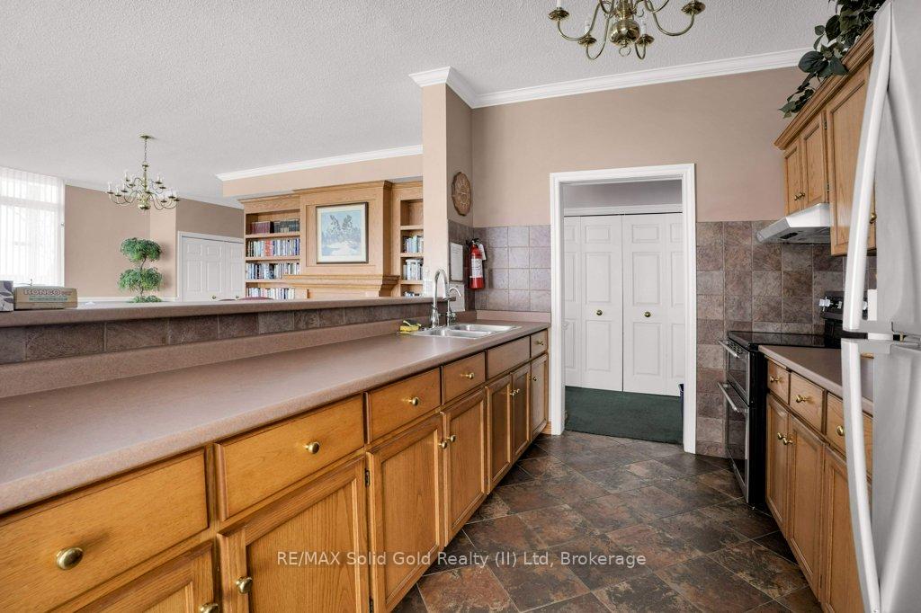 Photo 39 of Unit 402, 2 Lancaster Street E, Kitchener — HOMEH