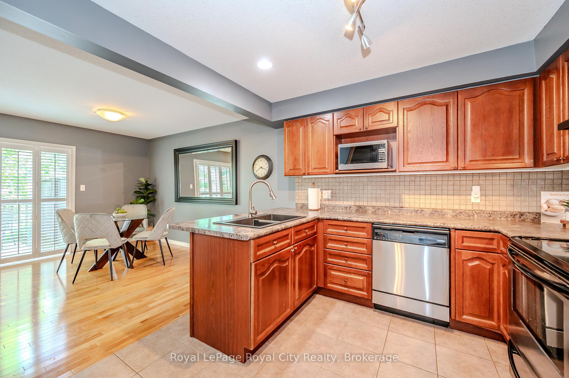 Photo 10 of Unit 31, 31 Schroder Crescent, Guelph, Grange Road — HOMEH