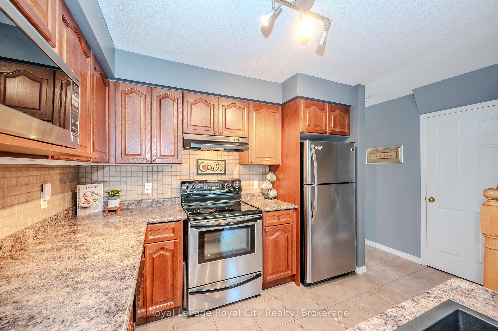 Photo 12 of Unit 31, 31 Schroder Crescent, Guelph, Grange Road — HOMEH